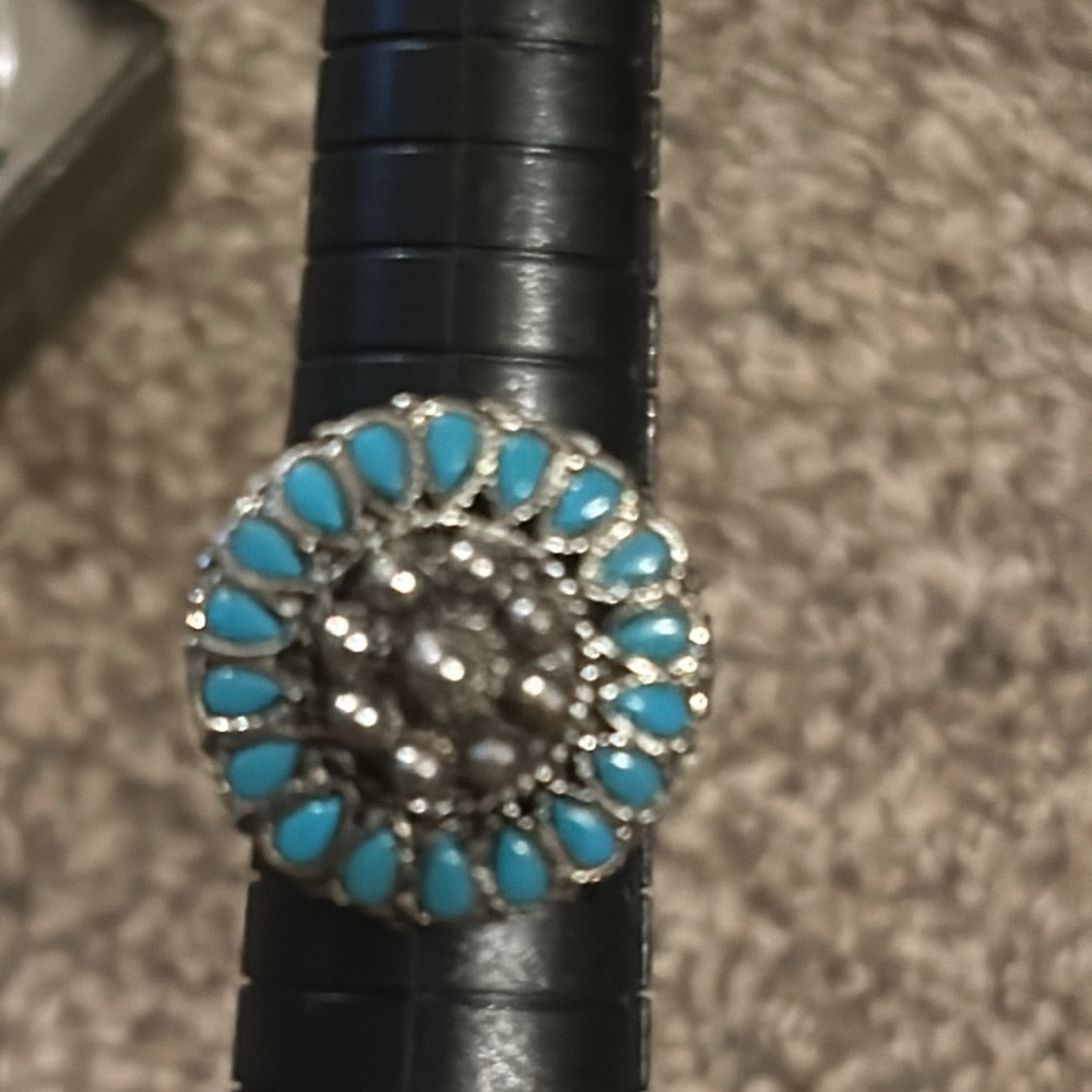 Turquoise colored adjustable ring very pretty